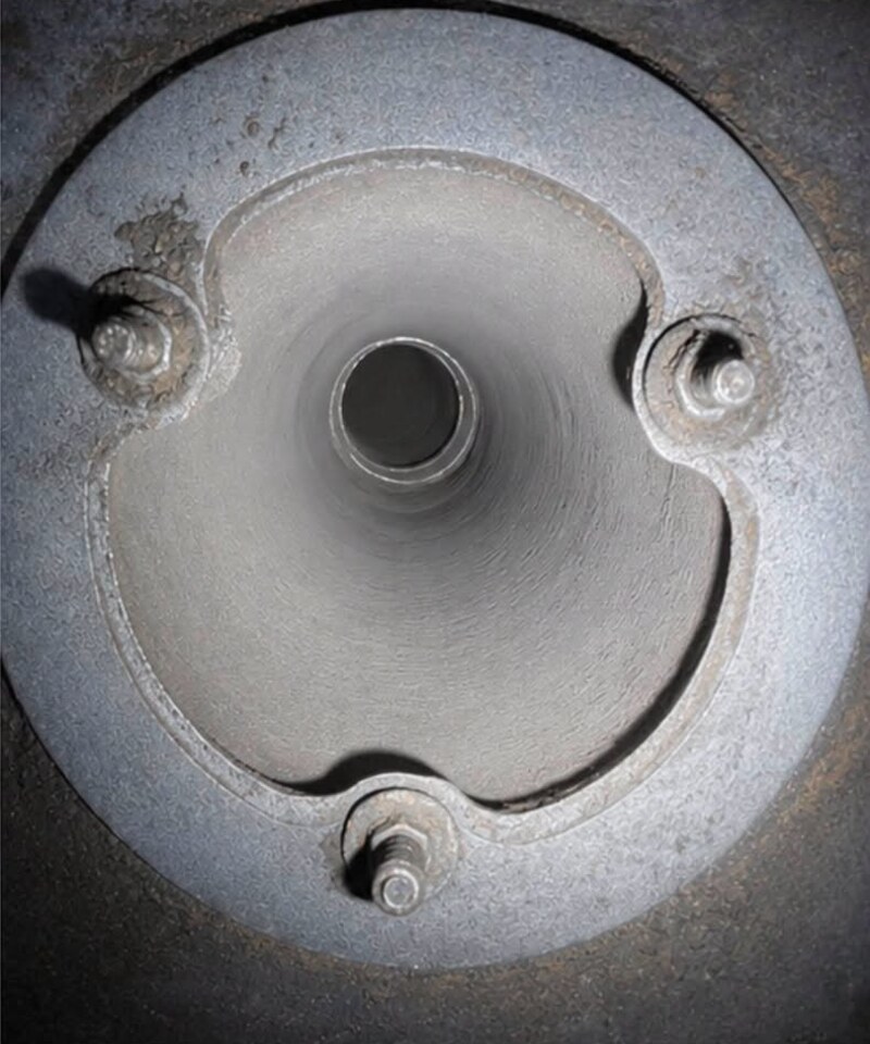 The same flue collar after sweeping, the cast ring and opening completely clear